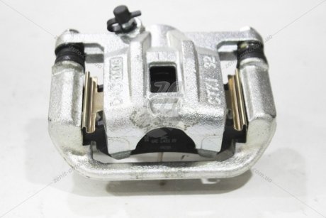 Суппорт Лачетти зад лев (в сборе) (с колодками) GM 96800085
