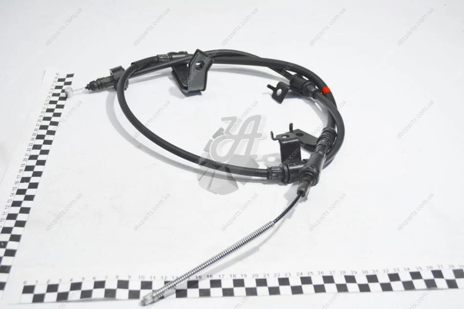 Трос ручного тормоза левый (внутри оригинал) (59760-1G000) KAP KAP (KoreaAutoParts) KM0703580 (фото 1)