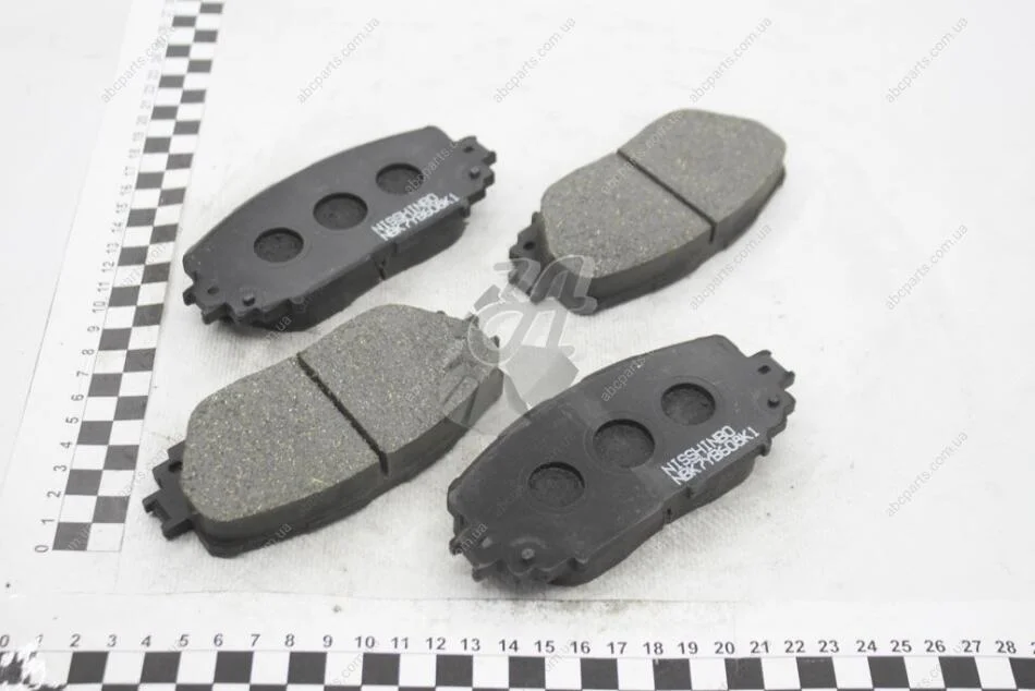 Колодки тормозные дисковые передние Toyota Yaris 1.3, 1.5, 1.8 (05-) NISSHINBO NP1060 (фото 1)