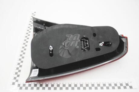 Фонарь задний Logan (-08) лев желтый RENAULT 6001546794