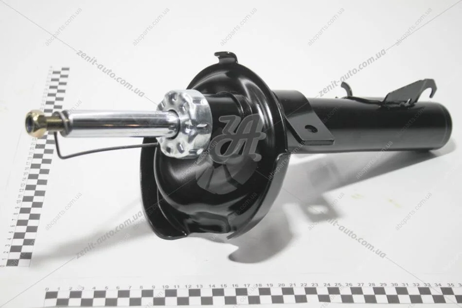 Амортизатор пер. лів. Mazda 3 (03-)/Mazda 3 (09-) Trialli AG 25150 (фото 1)