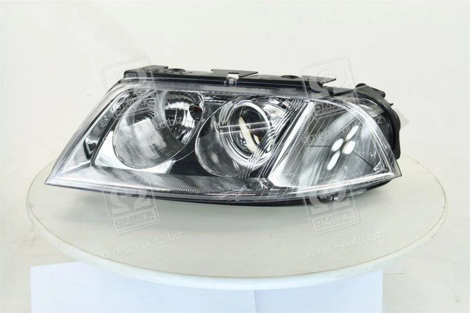 Фара ліва VW Passat B5 (01-) H7/H7 (20-6244-05-2B) TYC '206244052B (фото 1)