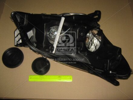 Фара ліва з моторчиком Opel Astra H (07-) H1/H7 (20-B208-05-2B) TYC '20B208052B
