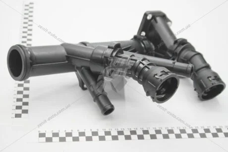 Термостат з корпусом VW Passat (13-), Polo (18-), Tiguan (16-), Golf (13-), Caddy/Audi A3 1.6D, 2.0D (17-) VAG 04L121026AH